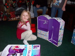 Avery with her new doll clothes trunk